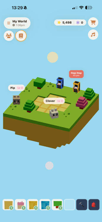 A player's island in PocketPets, with two pets, trees and arcade cabinets